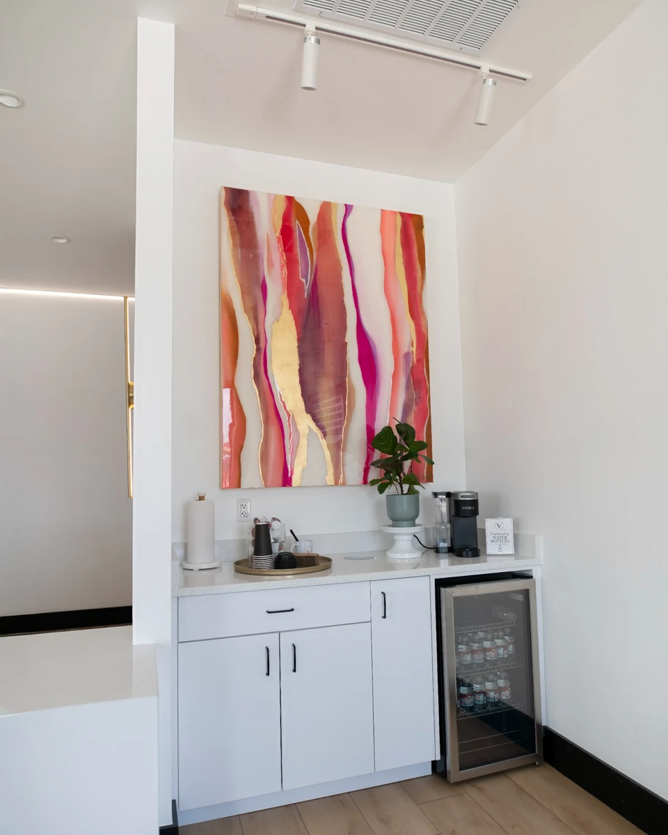 Village Dental Studio coffee and water bar with abstract artwork